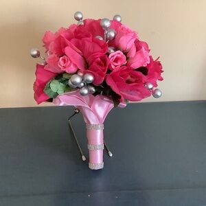 Pink roses, rosebuds and silver berries bridal bouquet